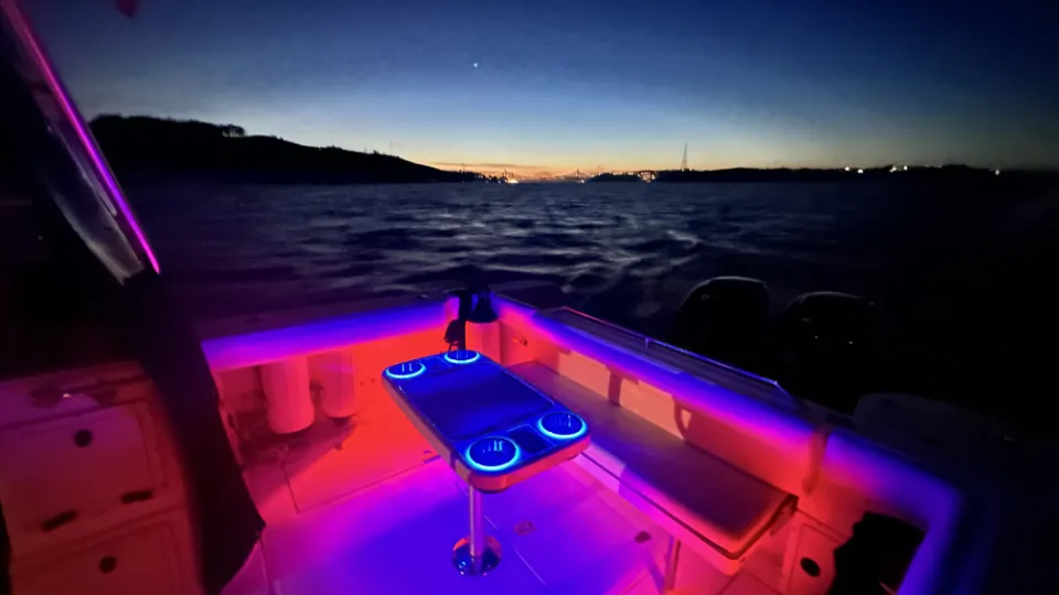 Aboard the Scarlett at night with nice glow of inerior lights.